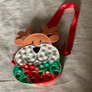 Christmas Reindeer pop it purse.